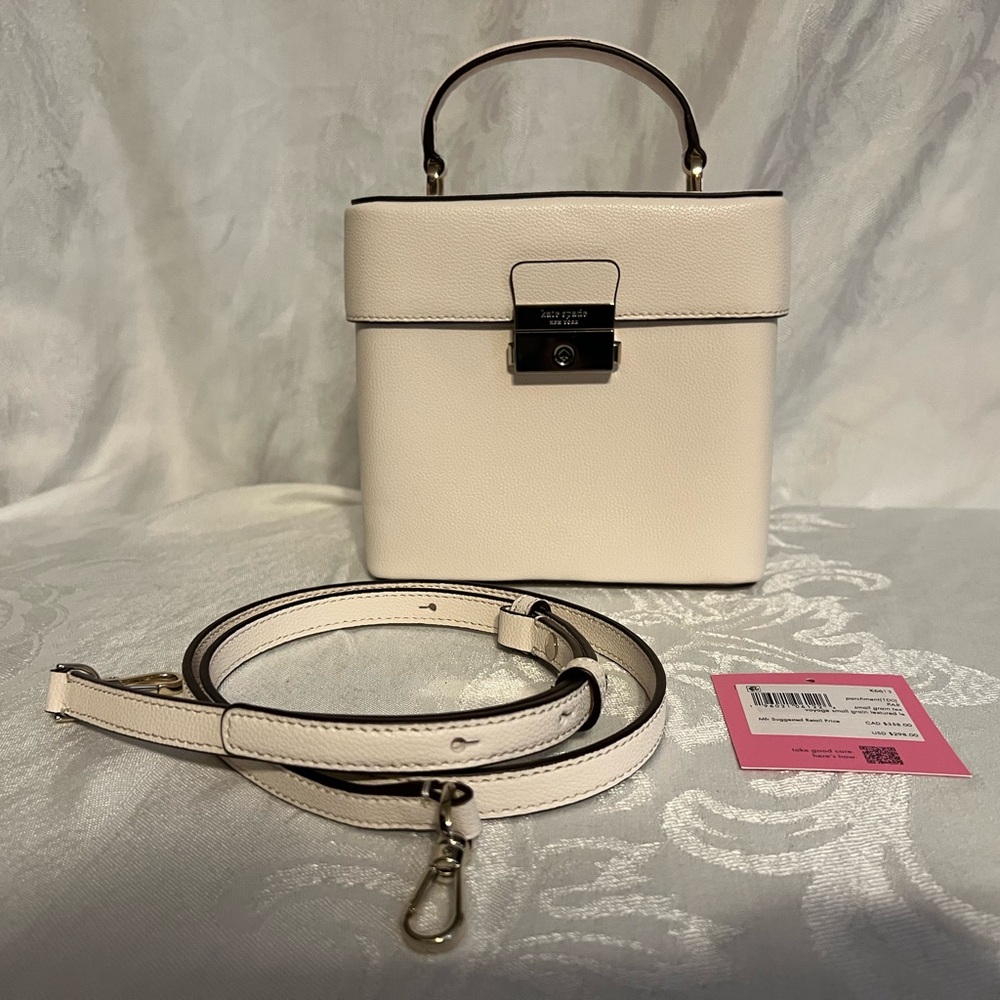 Kate Spade parchment voyage small grain textured leather handbag w/silver clasp